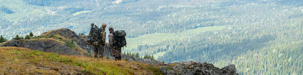 banner image of two hunters overlooking valley