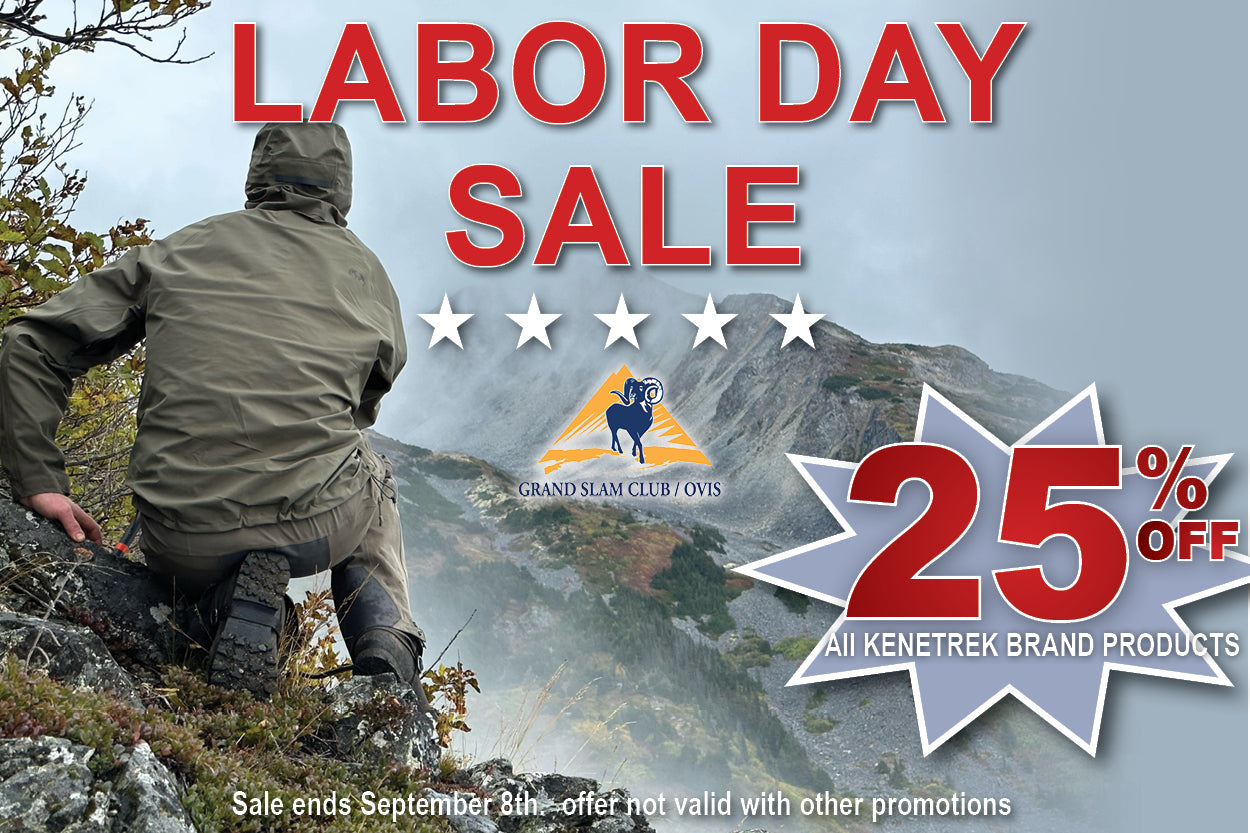 Labor Day Sale promotional graphic for Wild Sheep Foundation Kenetrek products, featuring a man in an olive green jacket and black pants kneeling on a rocky mountain path. Large red text reads 'LABOR DAY SALE' with five white stars, the Wild Sheep Foundation logo, and a starburst badge offering 25% off all Kenetrek brand products.