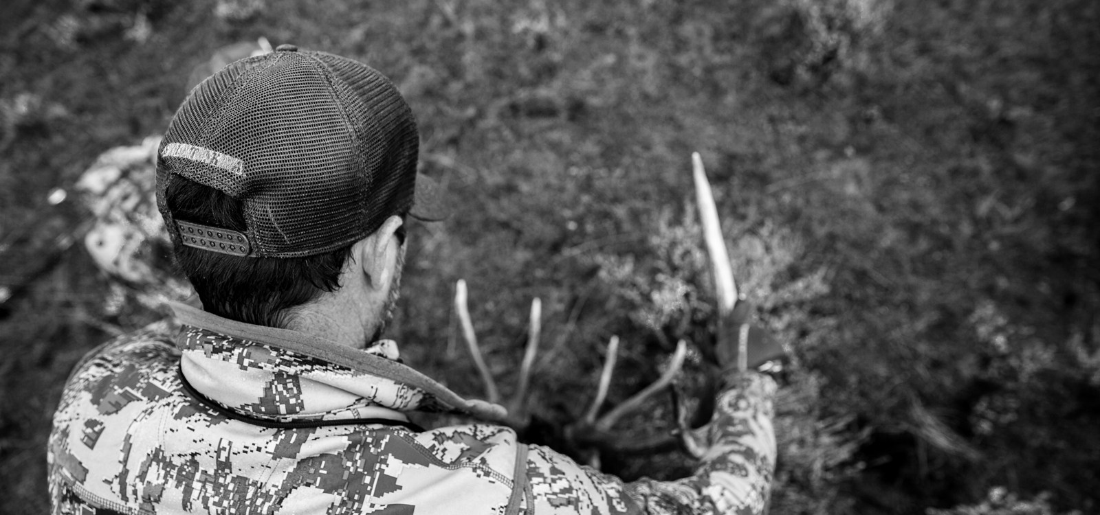 Man admiring horn harvest